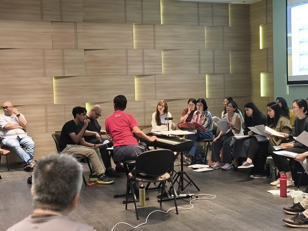 Young composer, Anvay Mathur, with mentor Bertram Wee and artistic director Jennifer Tham during score reading of work 'anãhata'